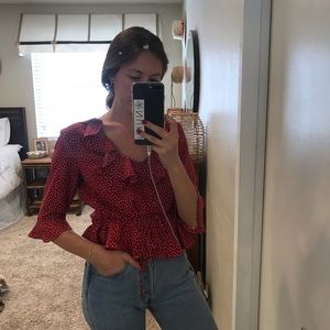 Red shirt with white dots